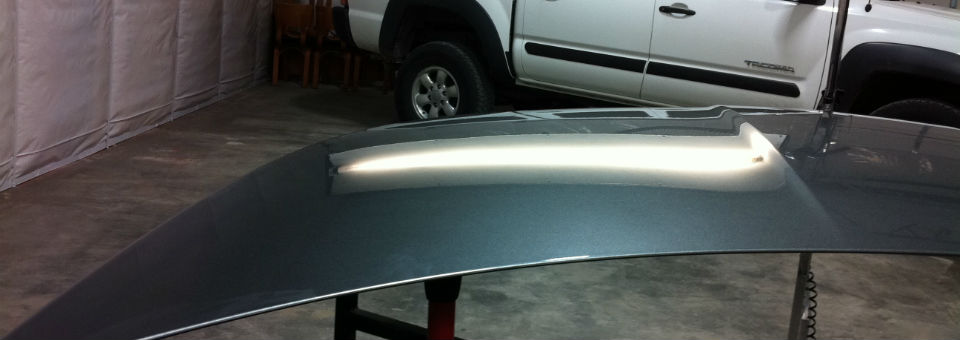 Nissan Murano Hood with Hail Damage After Paintless Dent Repair 