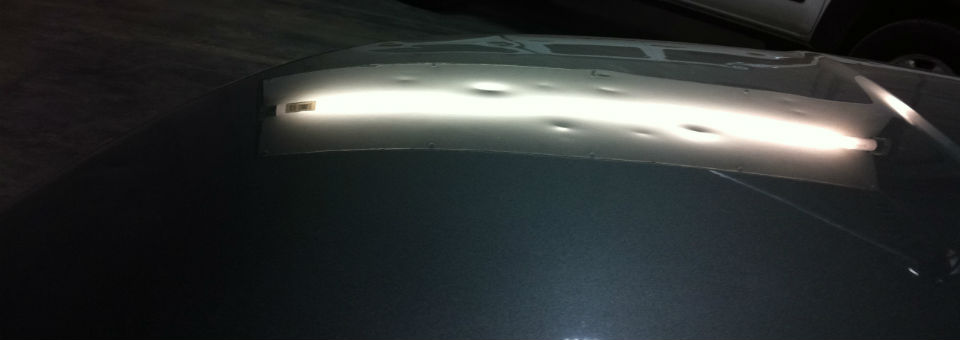 Hail Damage on Nissan Murano Hood.