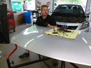 Mike Harkness Removing Hail Dents in Hood